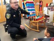 Commander Shonk Reading to Students