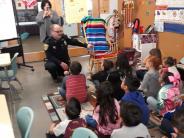 Commander Shonk Reading to Students