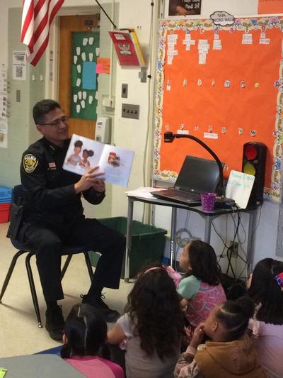 Chief Amado Reading to Mission View Students