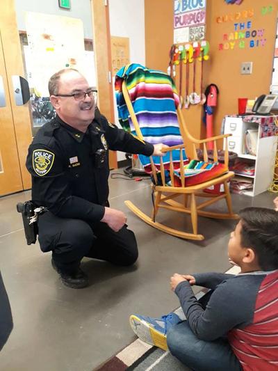 Commander Shonk Reading to Students